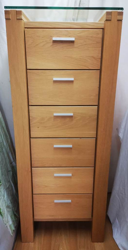 Extremely large oak tallboy with thick strong glass on top