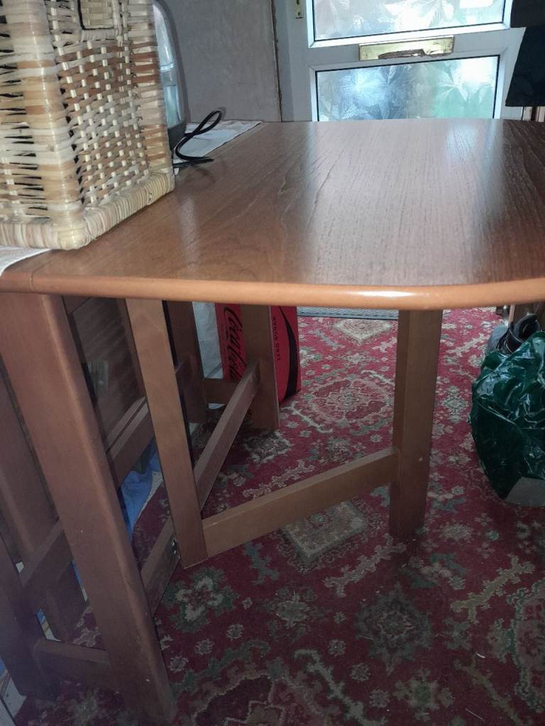 Sturdy Wooden Dining Table – Good Condition