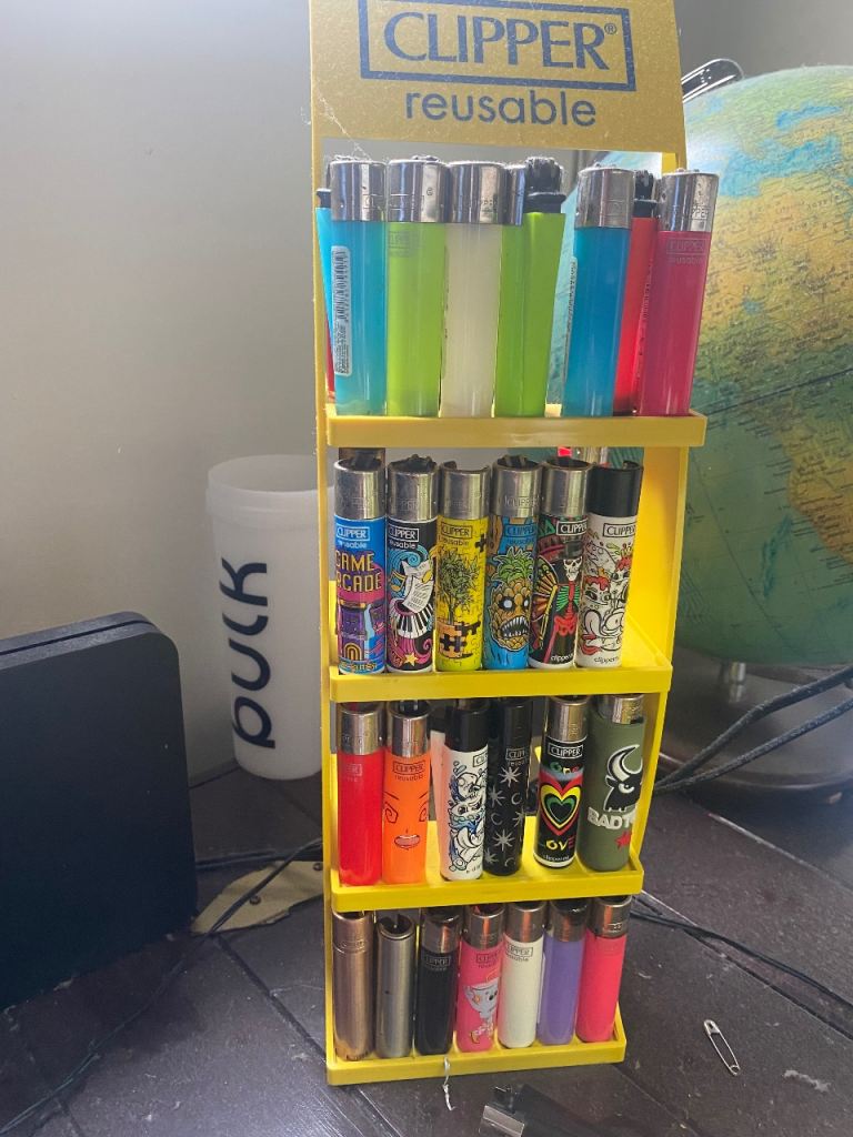 Clipper Reusable Lighter Display Stand – Good Condition