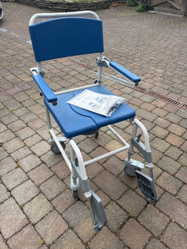 Shower wheelchair/commode on wheels