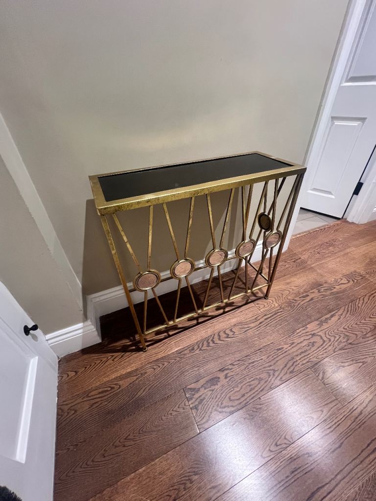 Stylish Gold Console Table with Black Glass Top
