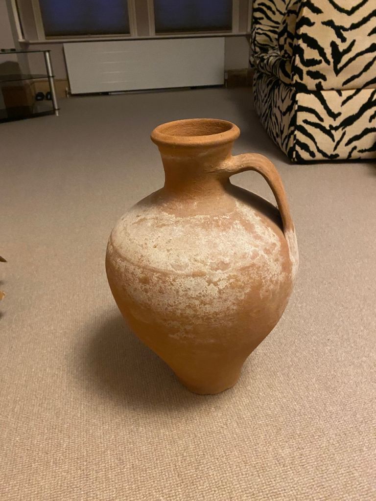 Vintage terracotta urn with handles