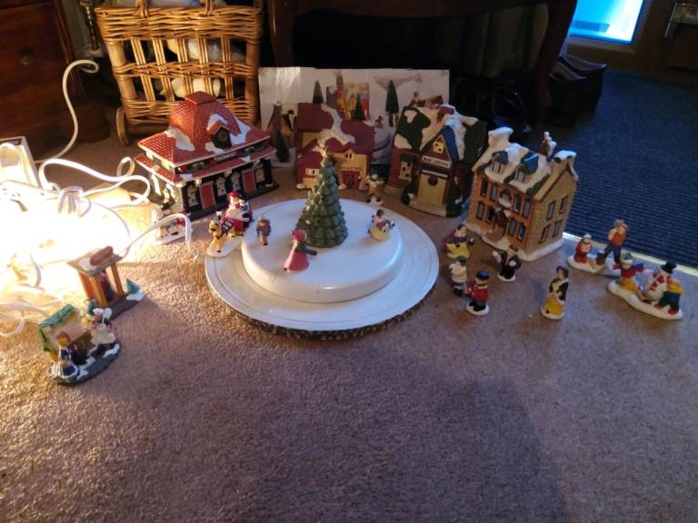 image for christmas village with sleigh and lights