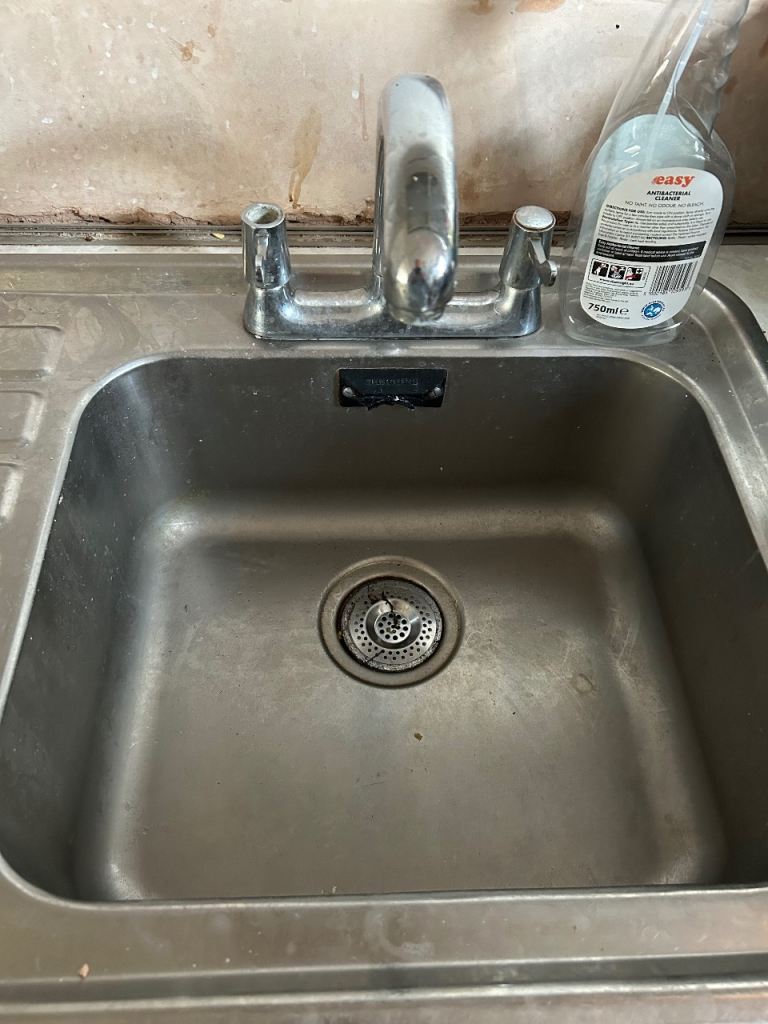 Kitchen sink and tap