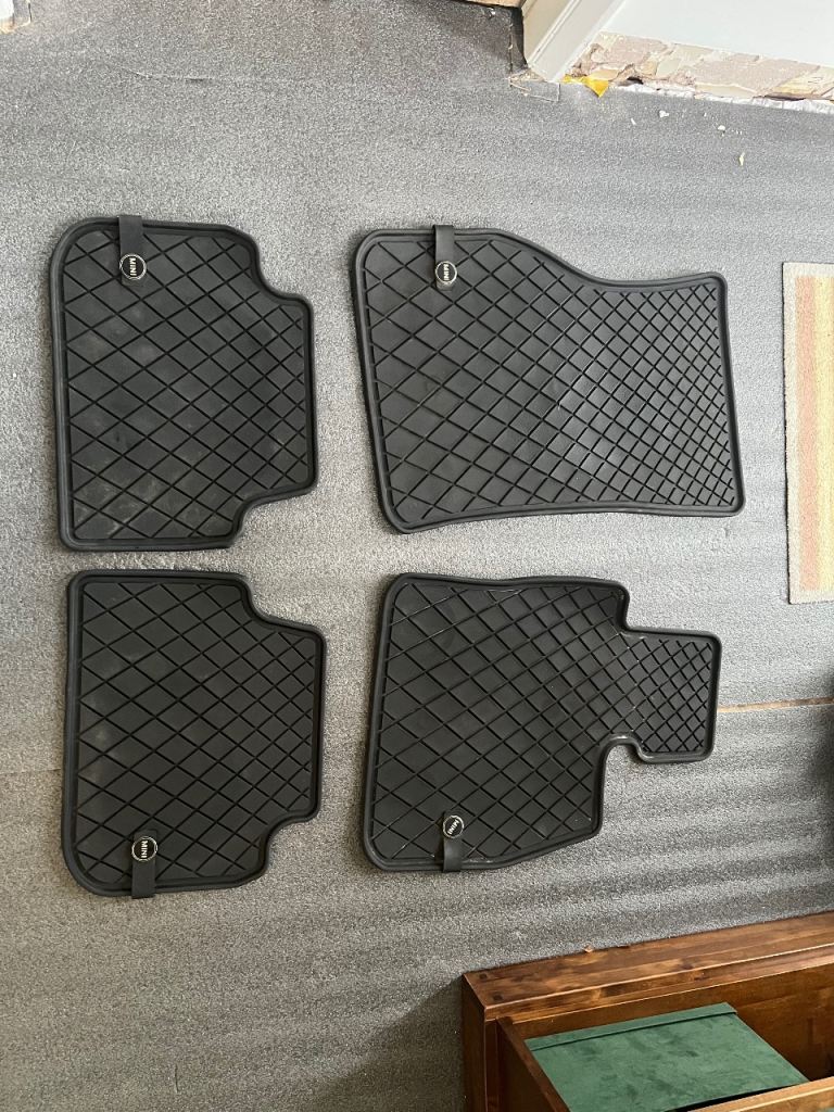 Genuine all weather front and rear rubber floor mats
