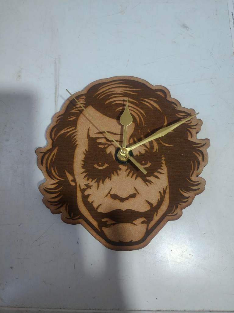 Clocks Lazer cut. Joker on MDF Derby in Ply