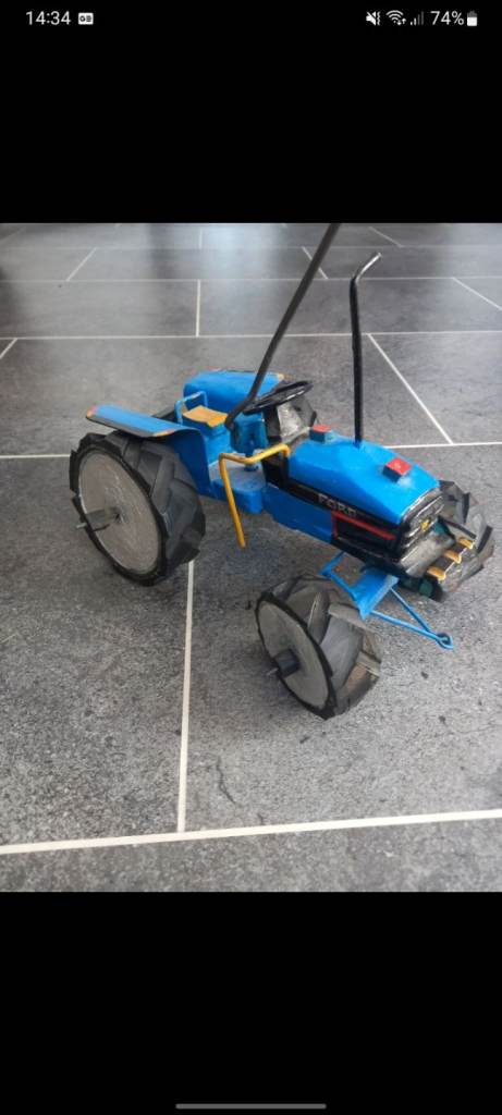 Handmade collectable ford tractor with steering pole