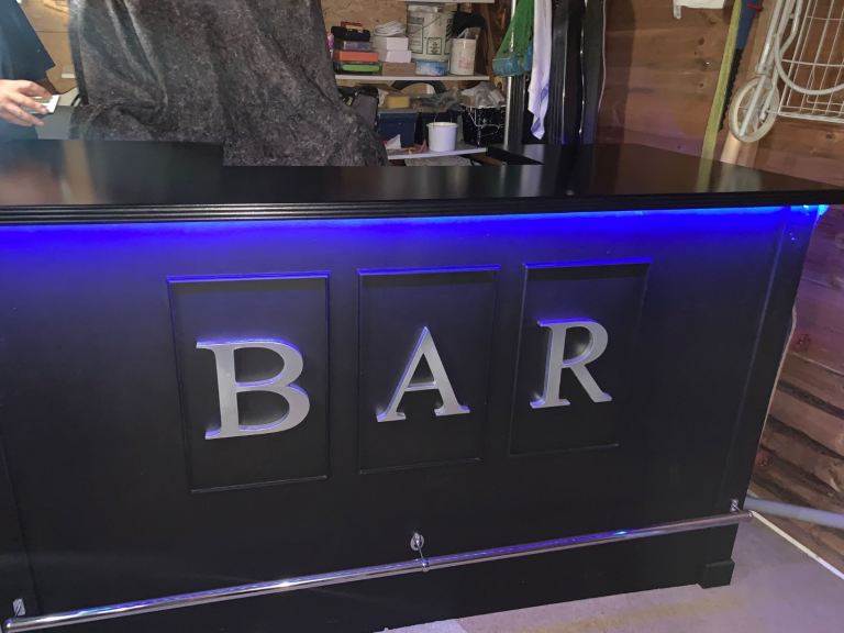 Bar, bar stools and drinking rack