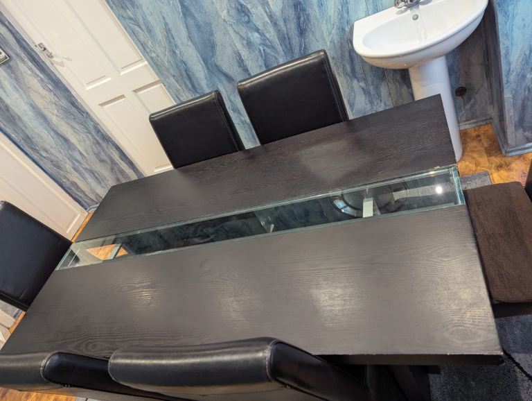 Glass top dining table with 6 chairs