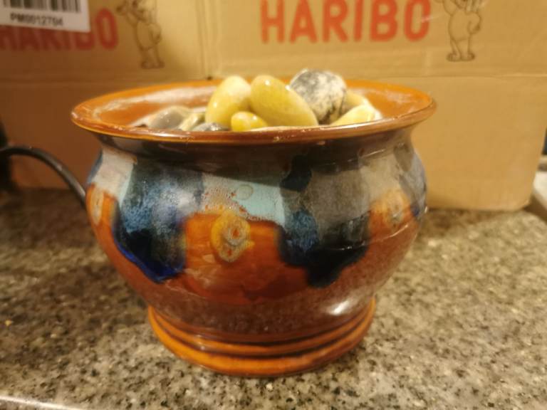 Water feature Ceramic Glazed pot with decorative pebbles 