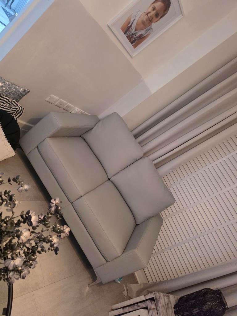 2 and 3 seater grey leather sofas 