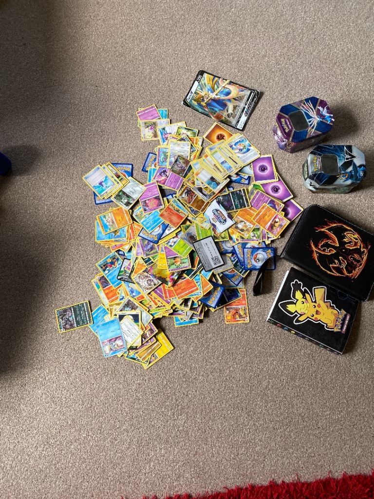 Large Collection of Pokemon Cards with Binders and Tins