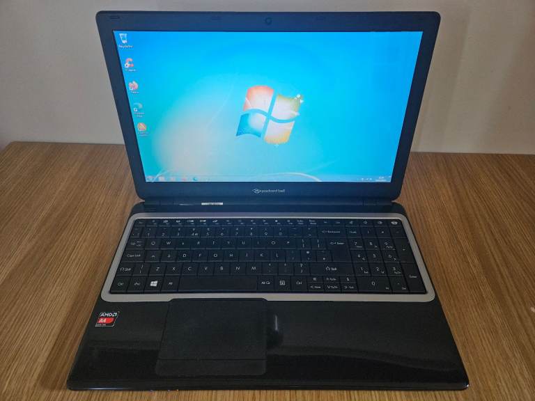 Windows 7 Pro laptop 15 inches Quad Core 4 GB RAM New SSD WiFi Office 2016