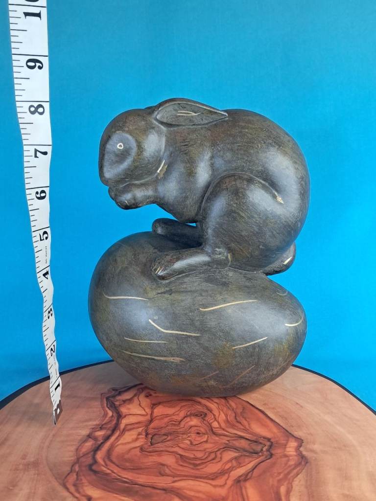 Large sculpture of a rabbit on Easter Egg.  As seen.