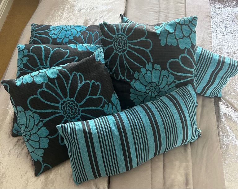 6 blue & black cushions