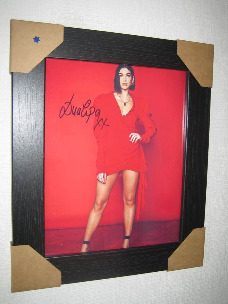 Dua Lipa Signed Photograph {8x10 inches} Framed with Certificate of Authenticity
