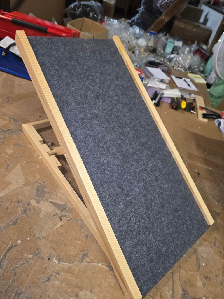 A new still boxed wooden folding dog ramp with 2 different hights .
