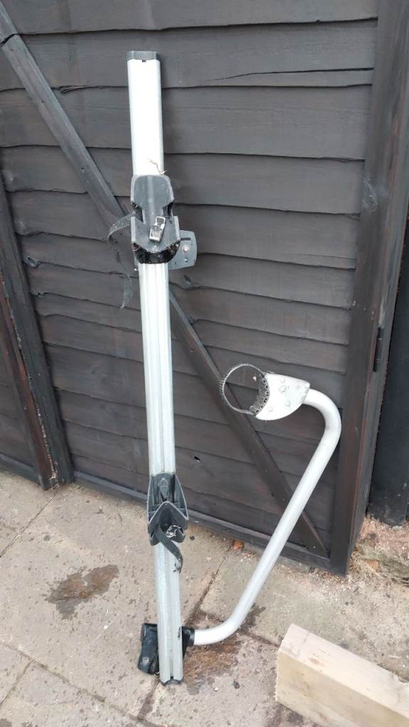 Genuine BMW roof-mounted bicycle carrier, likely manufactured by Thule for BMW.  With key.