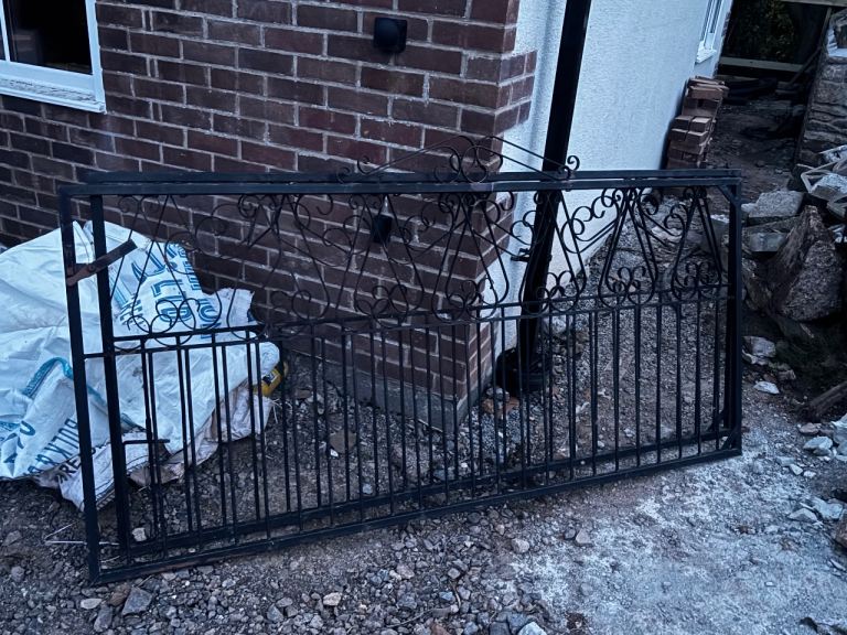 Two metal decorative driveway gates