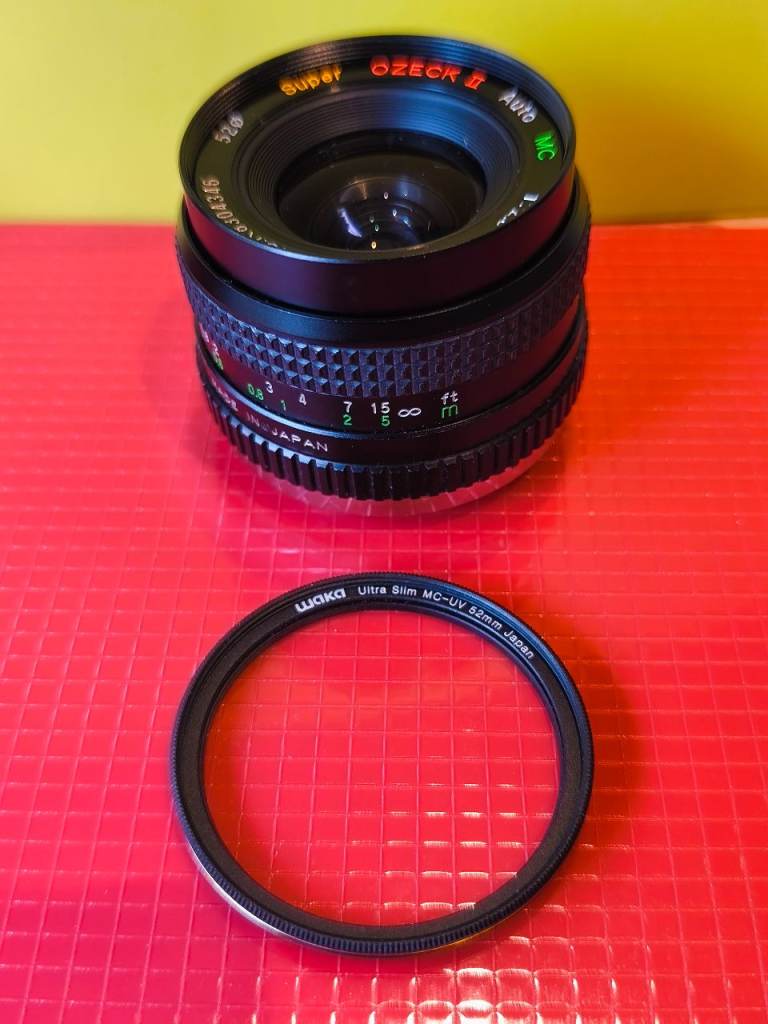 Olympus Zuiko 35-70mm, f4 zoom lens, VGC. 