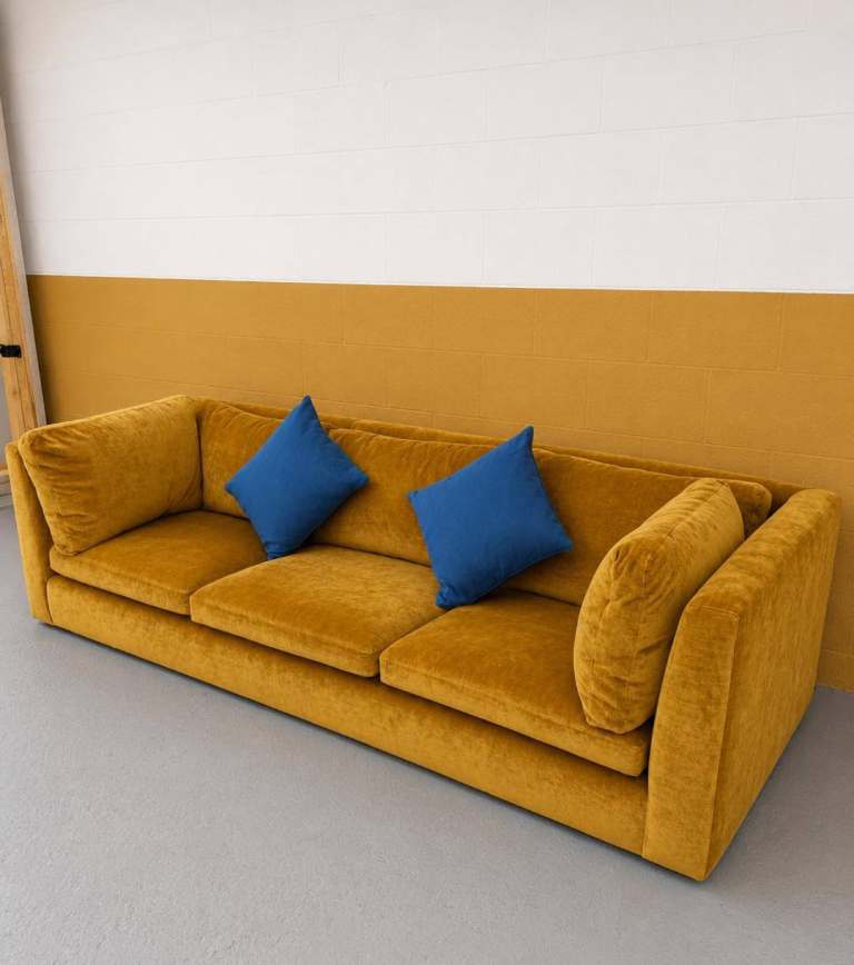 Stylish Gold Velvet Sofa with Blue Cushions