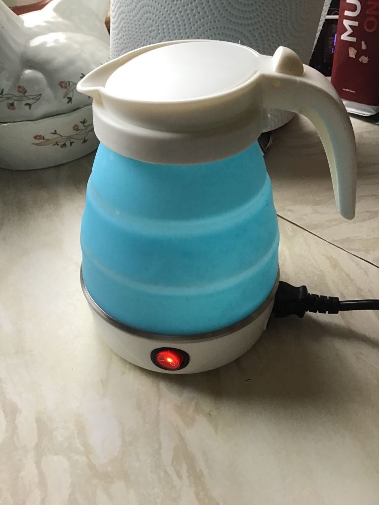 Fantastic collapsible camping kettle , handy for all your drinks, easy storage  power on/ off. Light