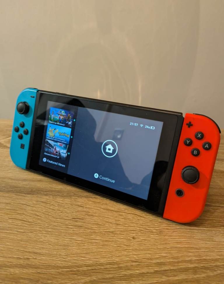 Nintendo Switch with various accessories, games and downloads