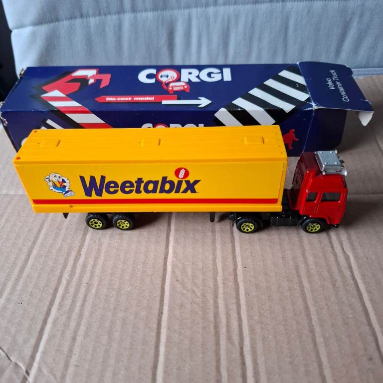2 x 1985 corgi trucks, 1 volvo weetabix and 1 scammel truck