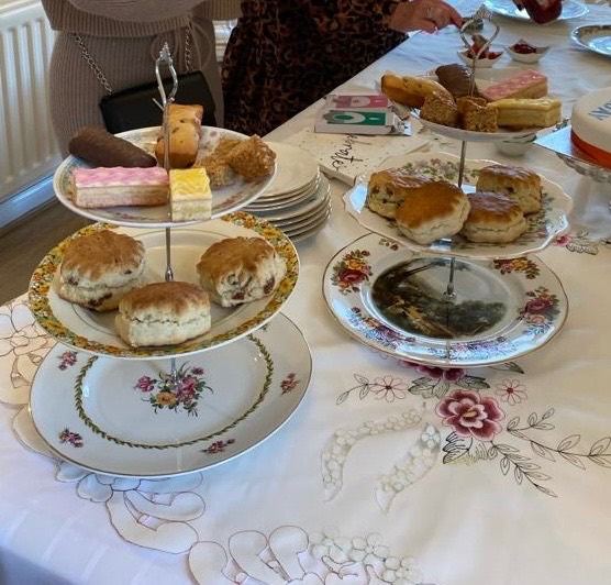 Cake stands, plates, cups, saucers, tea pot, etc
