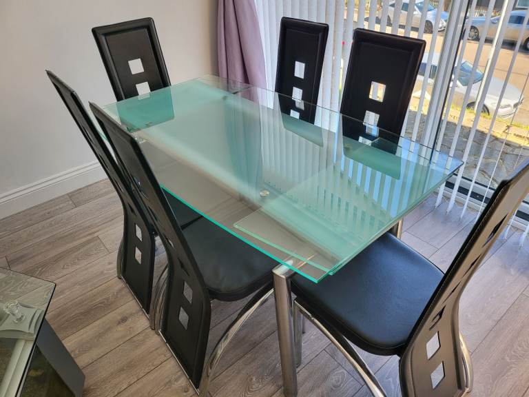 Glass dining table with 6 chairs 