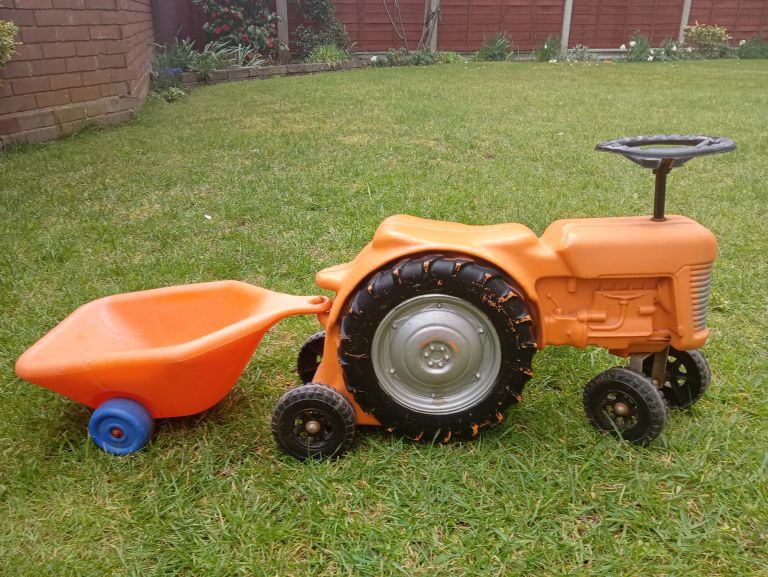 Kids Orange Ride-On Tractor with detachable Trailer – Good Condition