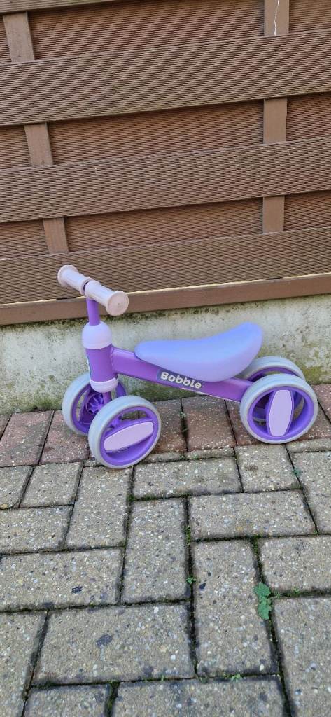 CHILDRENS BOBBLE BIKE. VERY GOOD CONDITION.