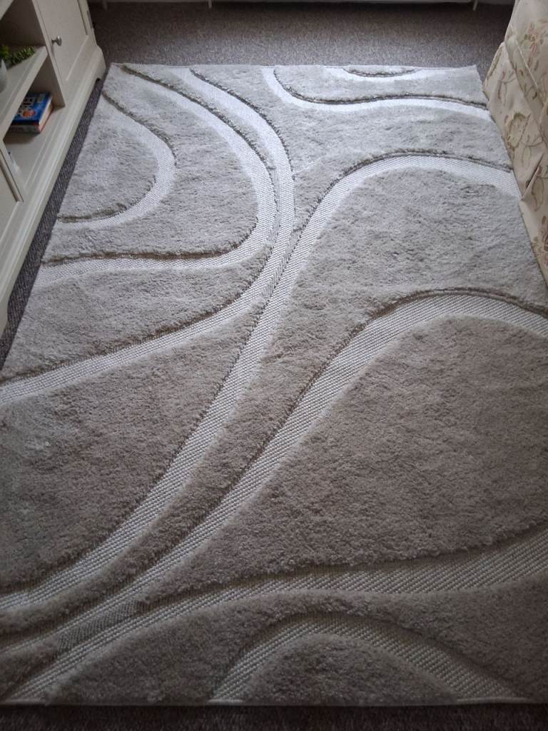 Stone coloured RUG