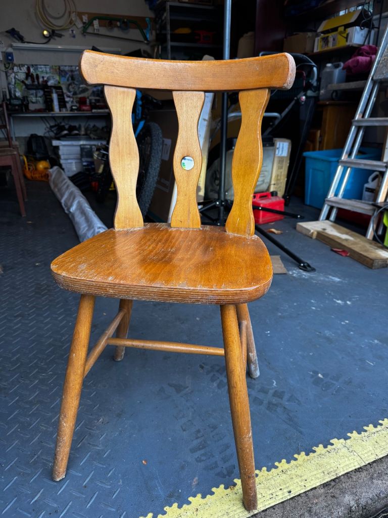 4 wooden chairs and a table