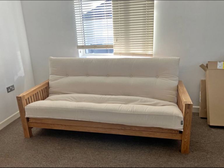 Solid oak Futon Company 3 seater sofa bed , displayed in showroom and put back in boxes 