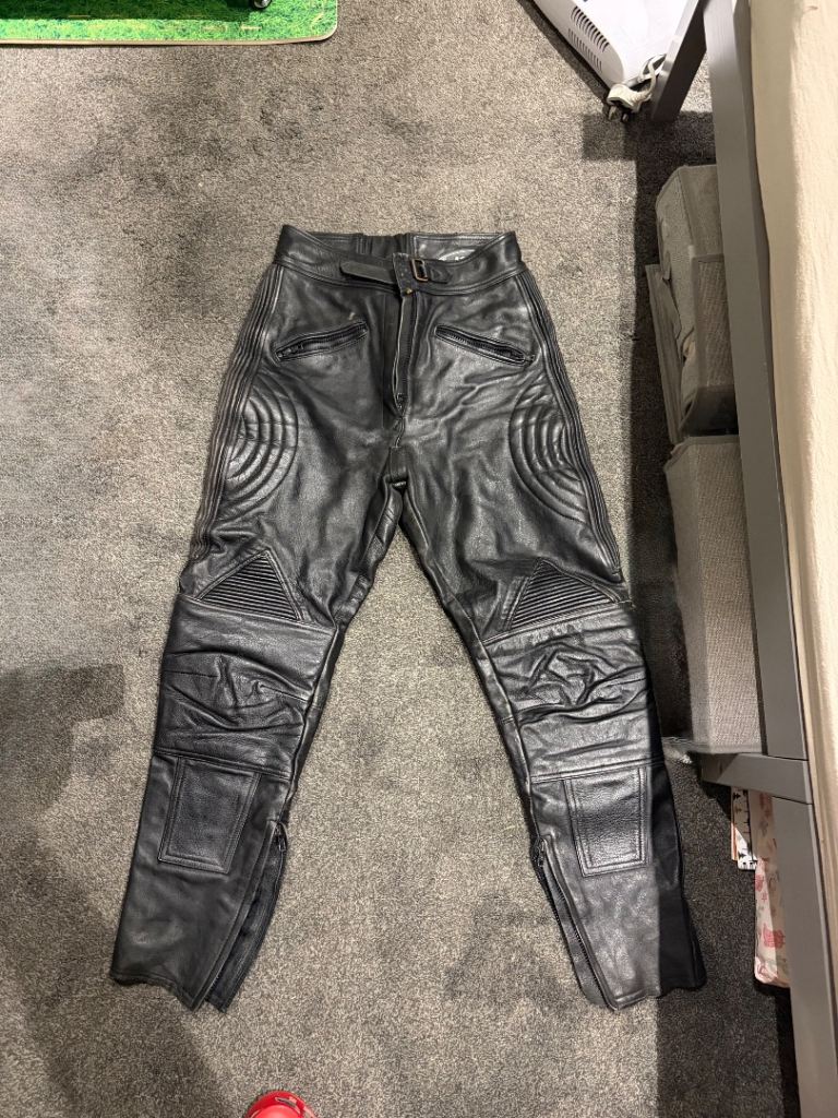 Genuine J&S leather motorcycle trousers in black, size 14. 