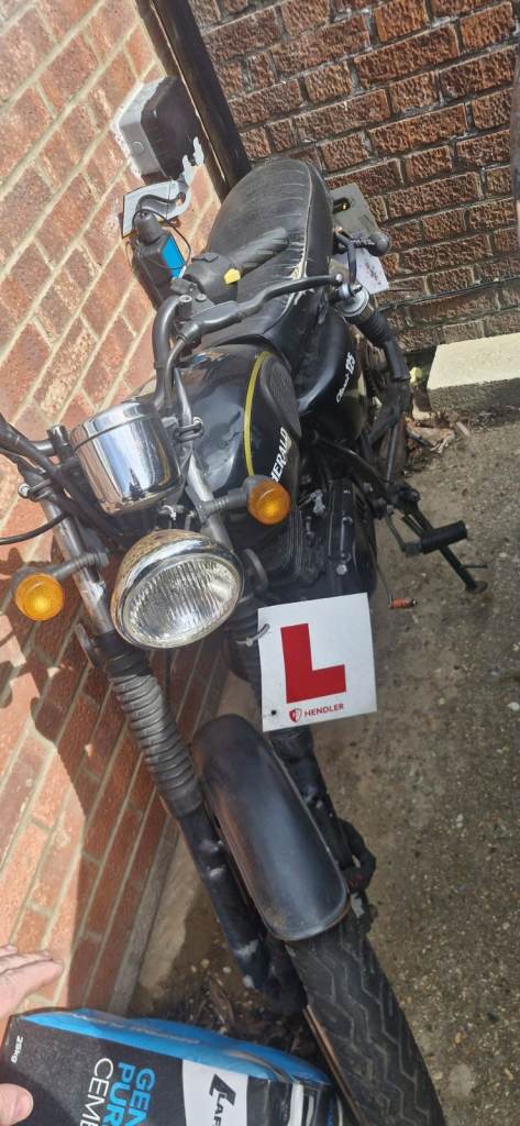 Herald 125 alongside a significant collection of spares