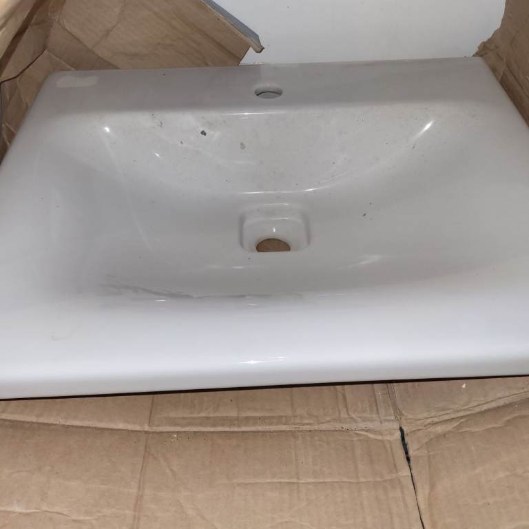 image for Ideal Standard white Sink with waste cover.