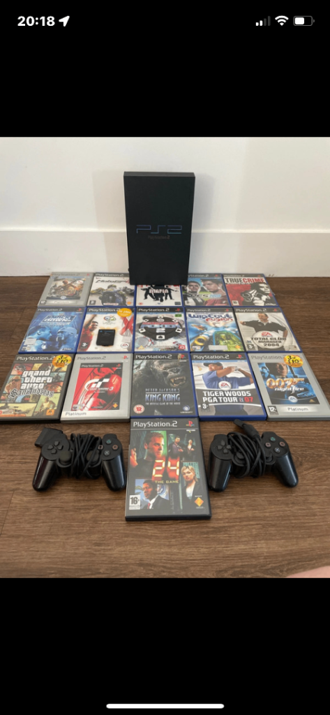 Sony PlayStation 2 Console with 2 Controllers and 18 Games
