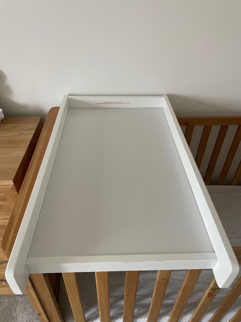 Cot top changing table