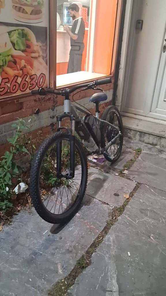 Grey electric conversion kit Mountain Bike with Blue Seat – Good Condition