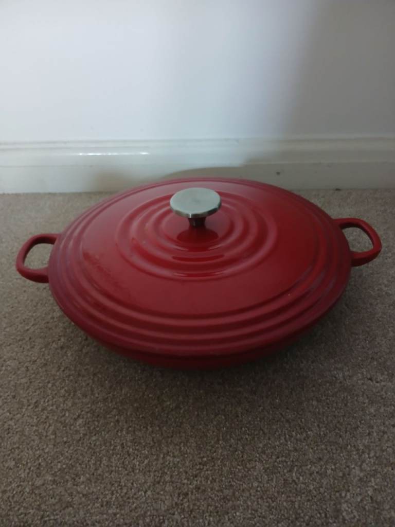 Red  cast iron shallow pan with lid