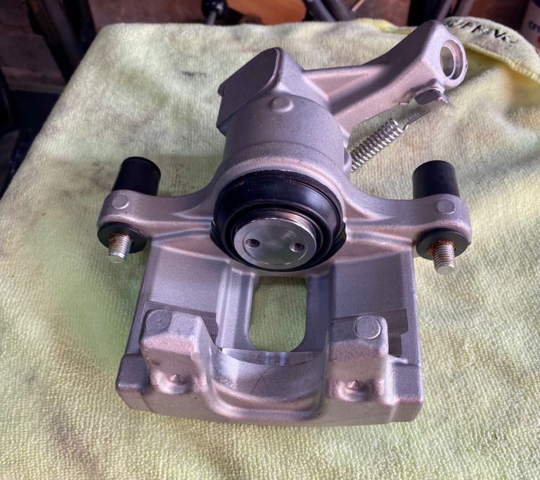 Rear near side brake caliper