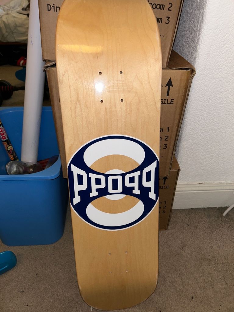 Skateboard Deck with PPoqq Logo