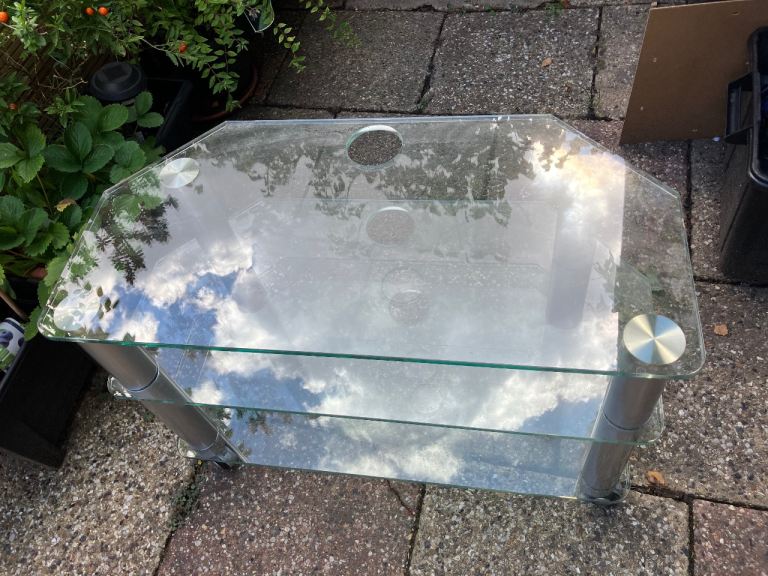 FREE Glass TV Stand with Shelves and Wheels – Good Condition