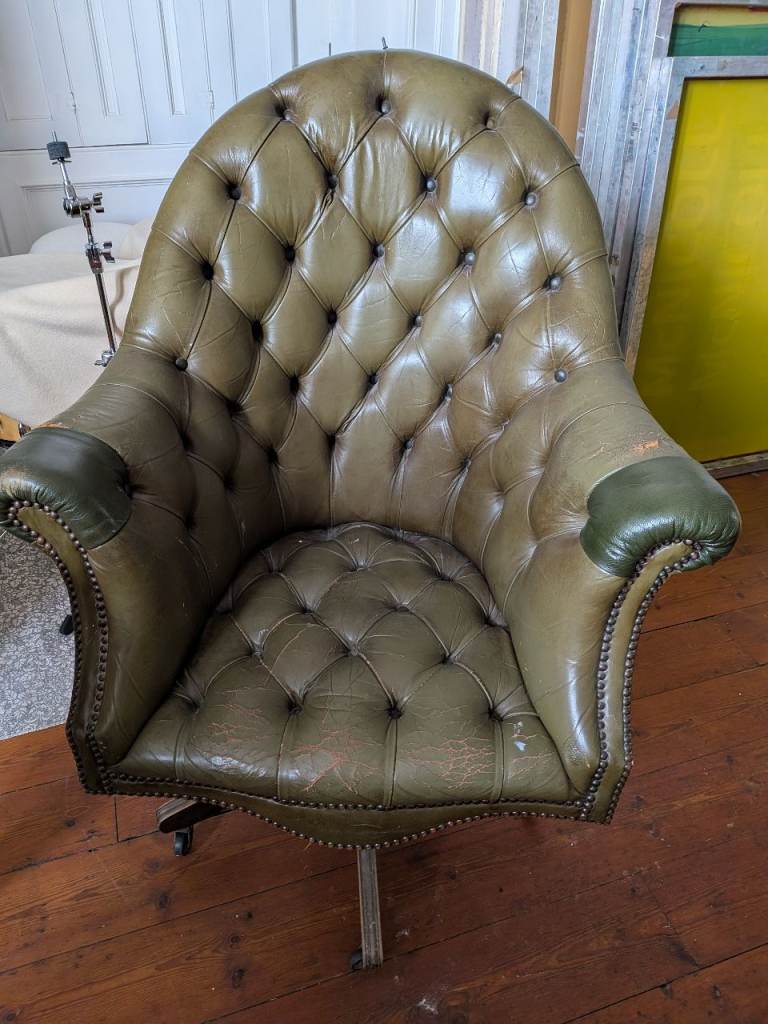 SOLD, pending collection Swivel chesterfield leather chair