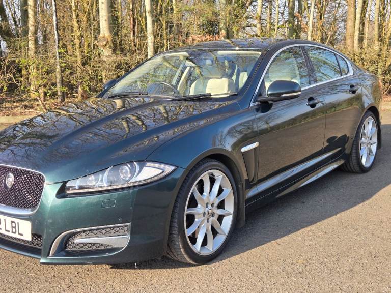  Jaguar XFS Premium Luxury rare British racing green metallic ivory white interior. 