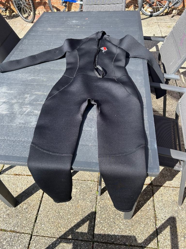 Kids wetsuits  x 3