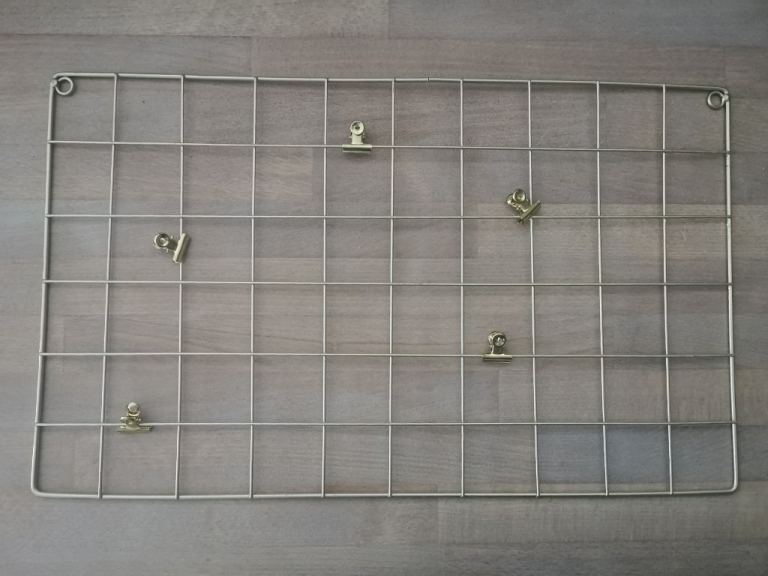 Gold coloured memo notice board