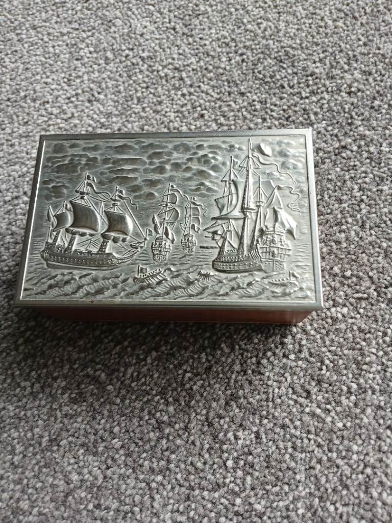 Antique box depicting sailing ships